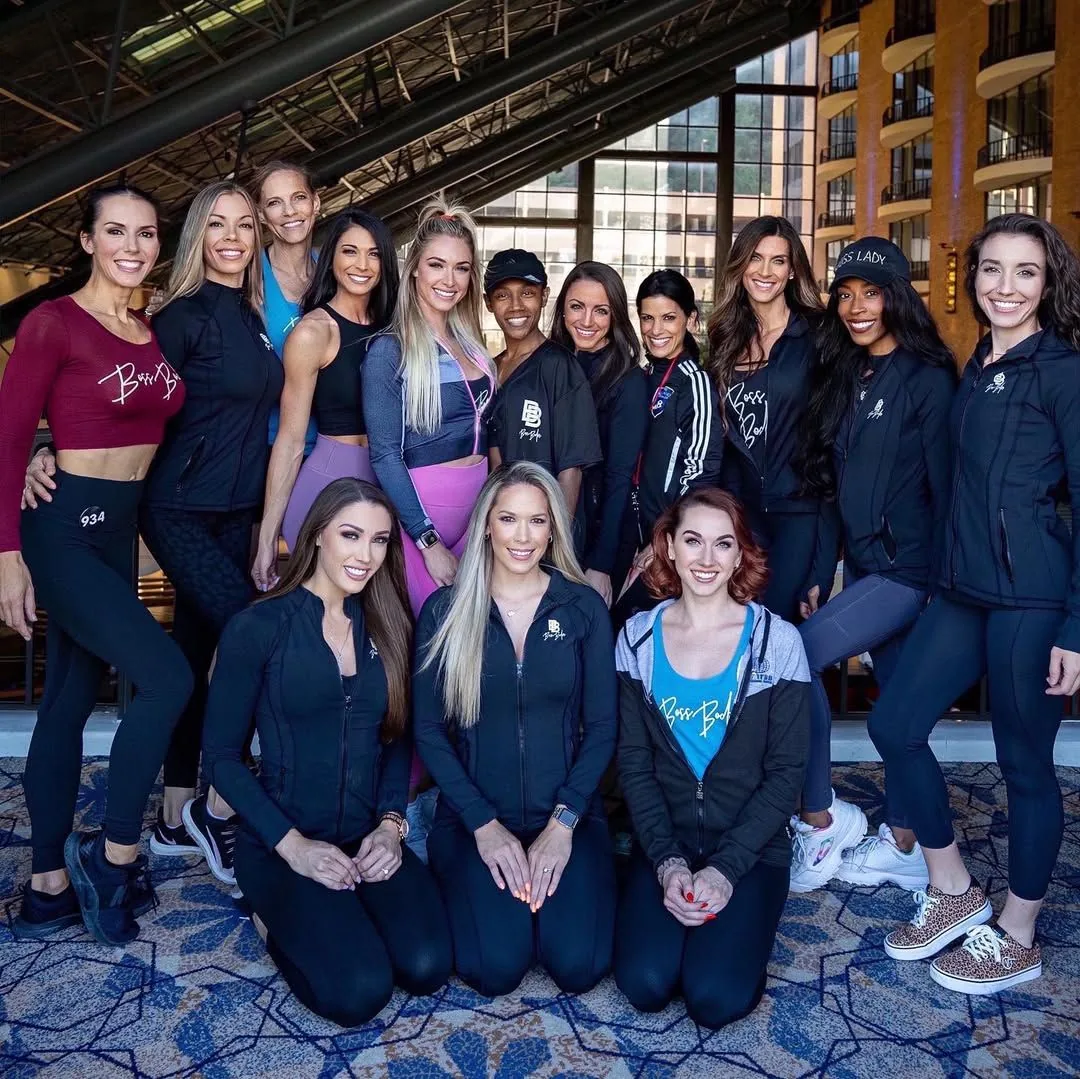 The all-female Boss Bodies coaching team at a bodybuilding competition